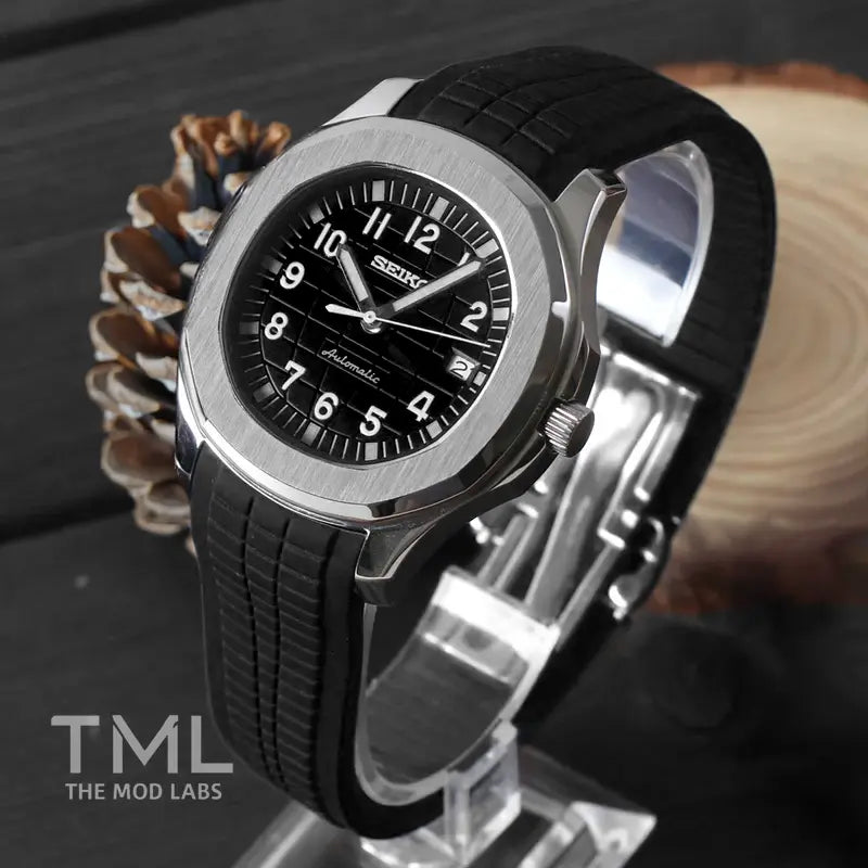 seiko mod aquanaut black watch with black rubber strap on a wooden surface, branded 'TML The Mod Labs'.
