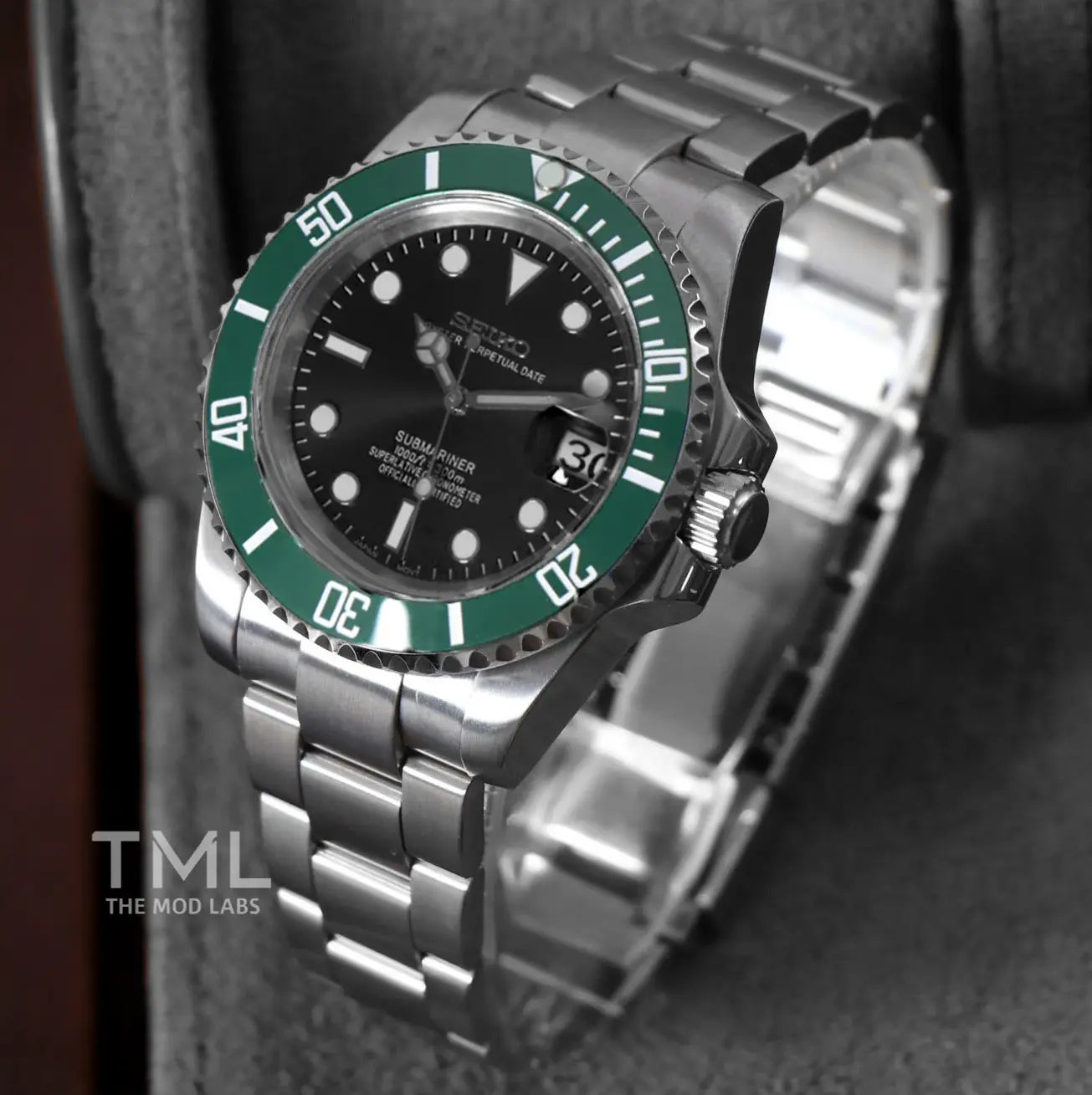 seiko mod watch green and black on a dark background the mod labs