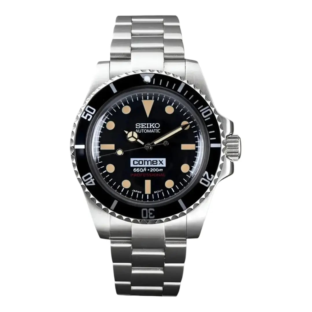 vintage Seiko mod watch with black dial and silver metal bracelet on a white background